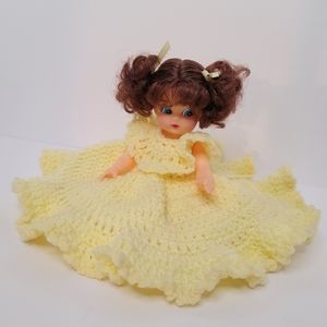 Brunette Girl in Hand Crocheted Yellow and White Dress